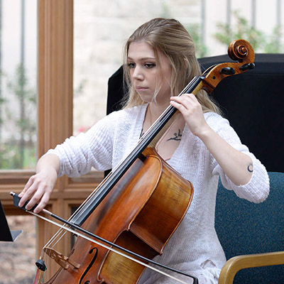 student playing cello