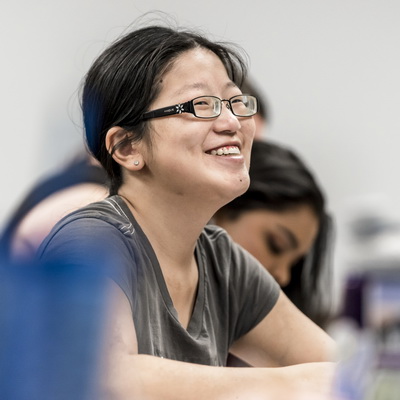 Asian girl smiling in class