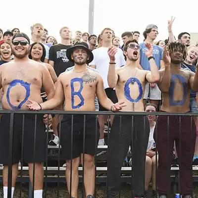 bod squad in stadium crowd at football game