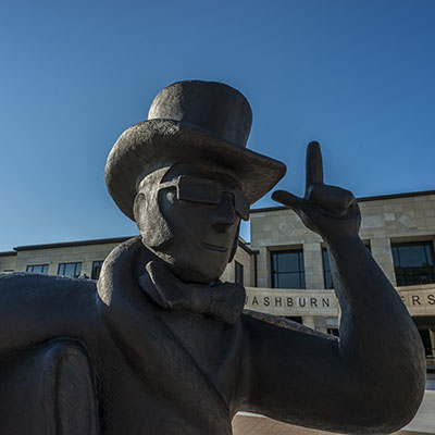 The Washburn statue is located in front of the Welcome Center at Morgan Hall.