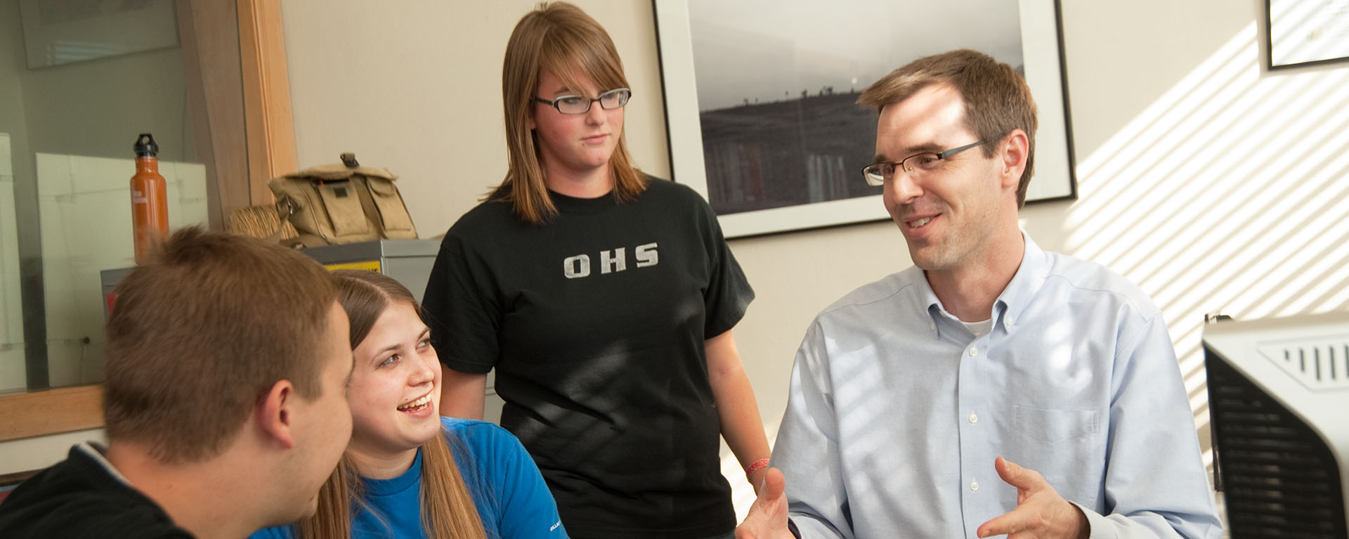 Instructor and students having a discussion