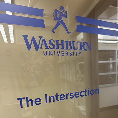 The Multicultural Intersectional Learning Space front door window signage