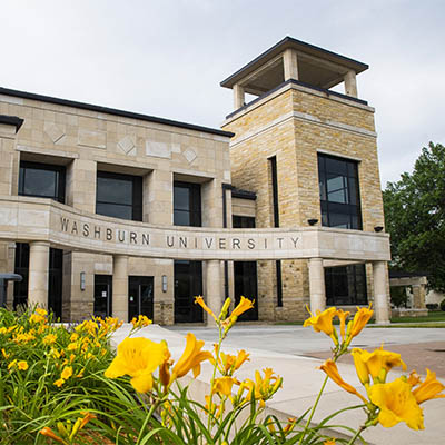 morgan hall exterior main entrance with flowers in foreground