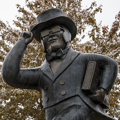 Ichabod statue with fall tree behind