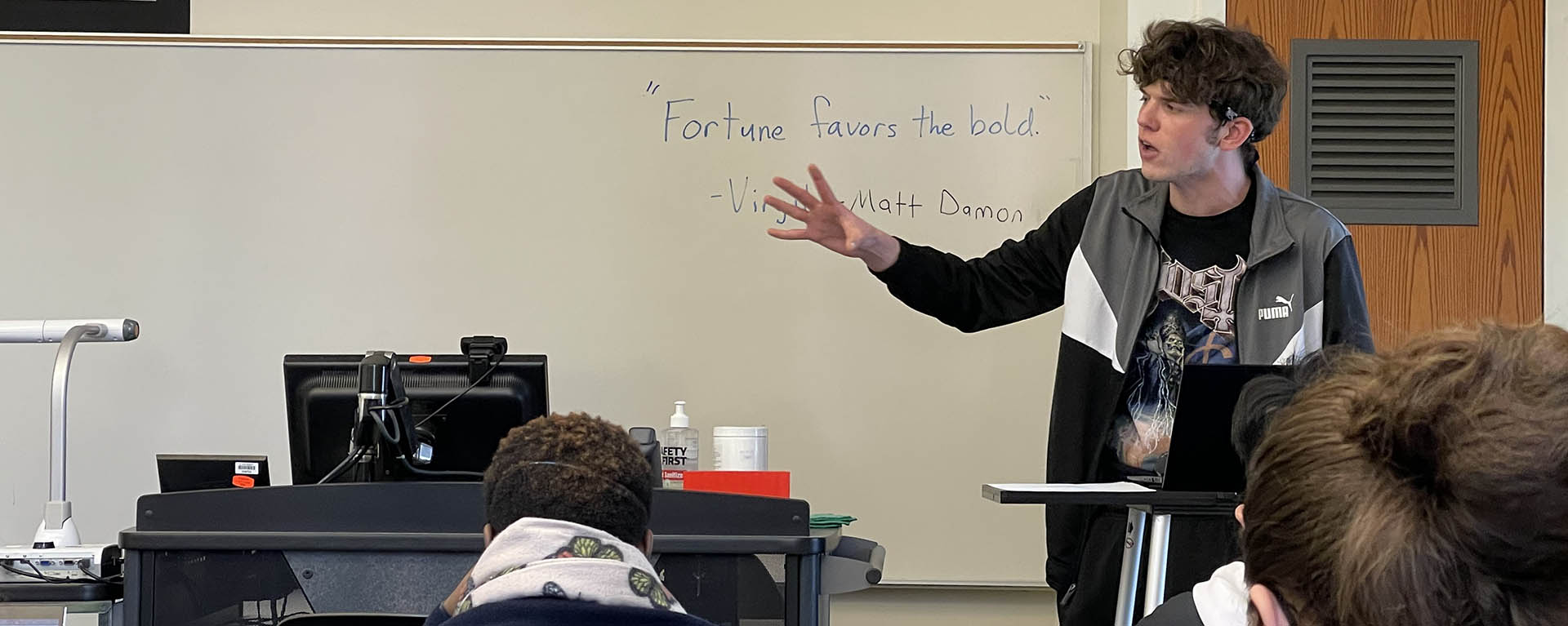 A student competes in a debate tournament.