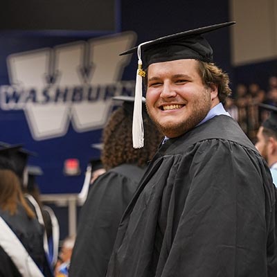 female graduating student smiling