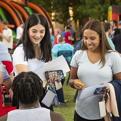 Students walk among the booths at WUFest during Welcome Week.