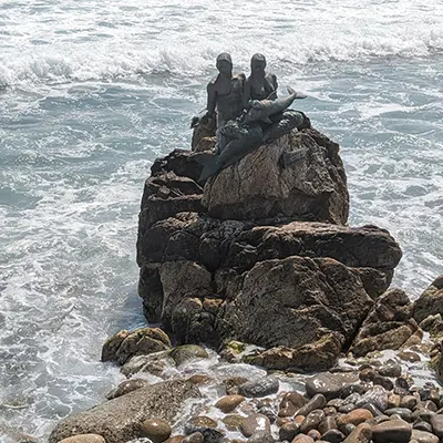 Waves crash on a beach.