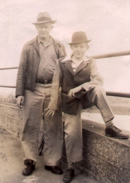 Max Yoho and his dad, Lloyd, atop river bluff