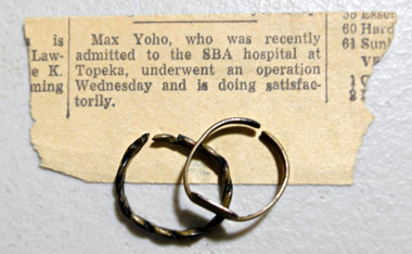 Max's mom kept these rings and a newspaper statement in an envelope with family photos